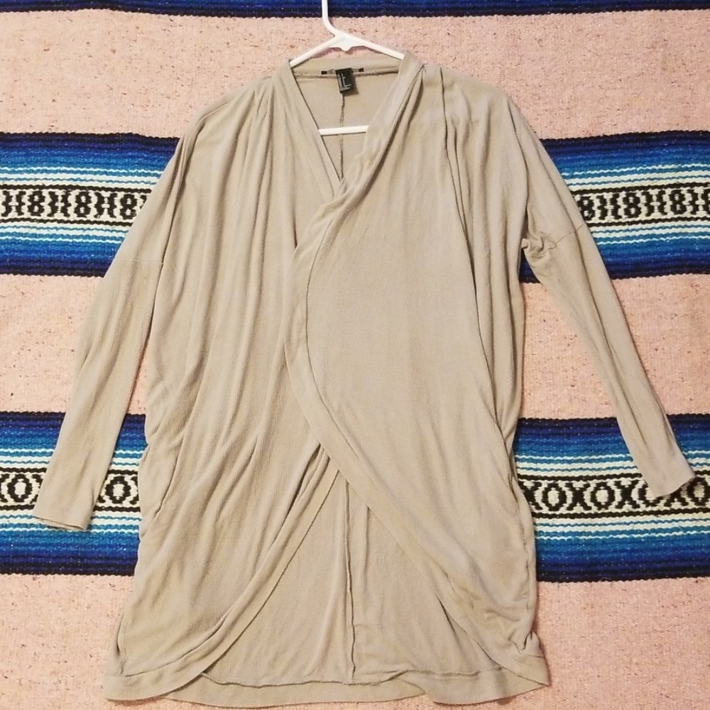 Thin tan sweater.